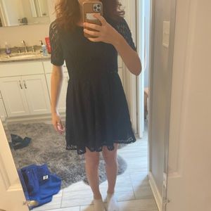 Blue lace fit and flare dress cut out back